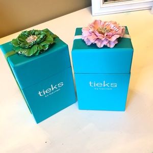 Set of two mini Tieks boxes.